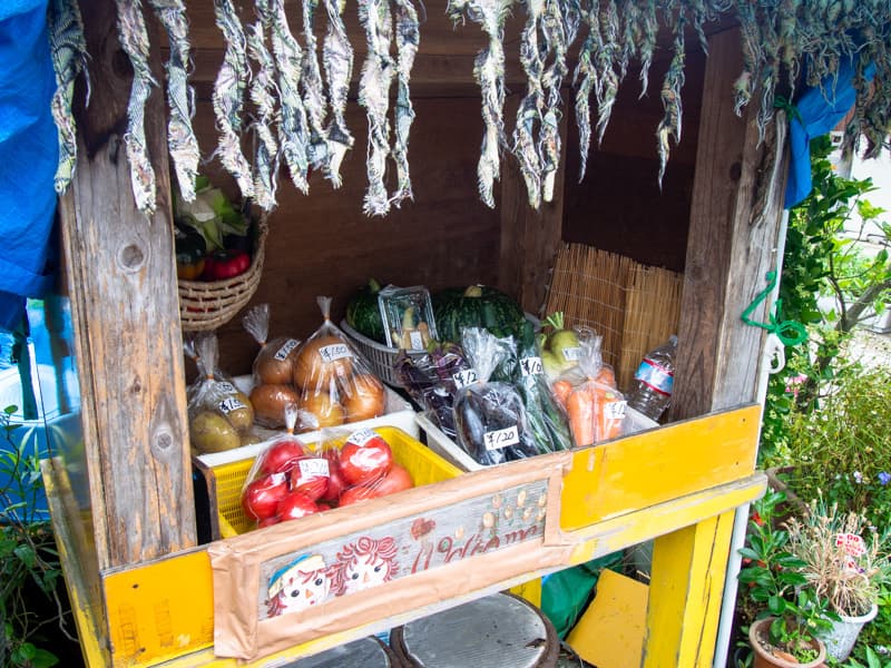 An unmanned shop selling fresh vegetables along the Shikoku Pilgrimage trail.