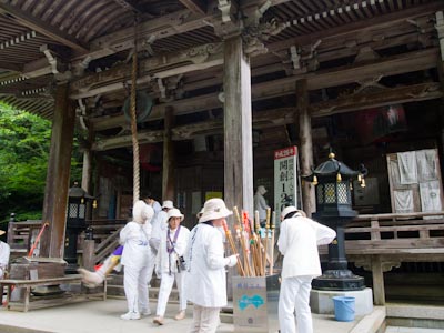 Pilgrims preparing in front of a temple in Japan